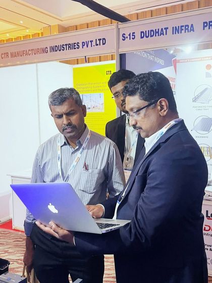 Using a laptop to demonstrate my energy management software to consultants at the IEEMA meet.