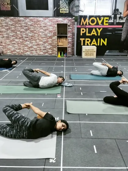 Guiding my clients through a mobility session. It brings me joy to create a supportive space where everyone can work on their own journey, celebrate their progress, and learn to listen to their bodies. We are all in this together.