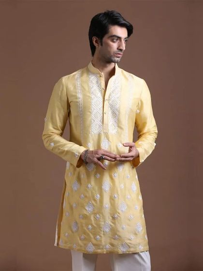 The perfect Haldi outfit should be vibrant and stylish. This yellow embroidered kurta brings together tradition and modern flair, allowing you to step into your celebration with comfort and grace.