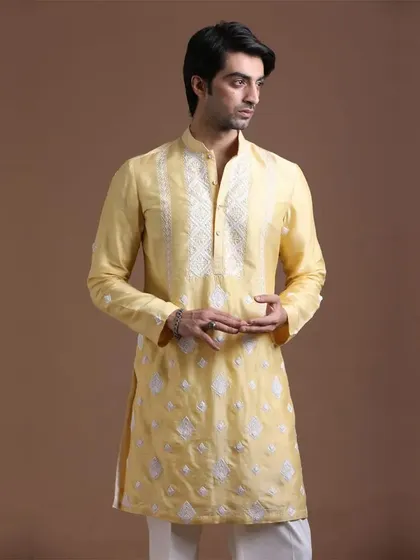 The perfect Haldi outfit should be vibrant and stylish. This yellow embroidered kurta brings together tradition and modern flair, allowing you to step into your celebration with comfort and grace.