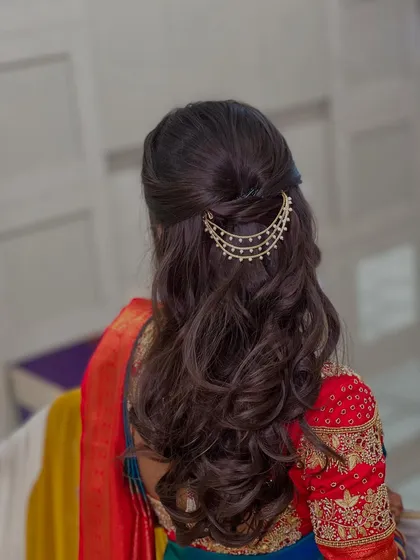 A detailed shot of the elegant, tiered hair accessory used to complete this modern traditional hairstyle.