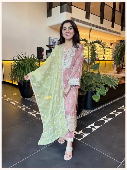 A beautiful rose-pink kurta set with a contrasting lime green dupatta. This is a festive piece that is still light and easy to wear.