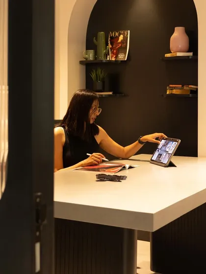 The MD's cabin at Bubble Network Global, designed for focus and collaboration. The arched niche adds architectural softness, while the clean lines of the desk and shelving maintain a modern, professional feel for this workspace interior.