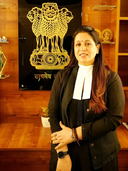 A professional portrait in my chamber, with the emblem of India behind me. It serves as a constant reminder of my duty to uphold the law.