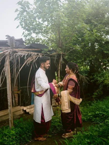 A quiet moment of connection between the photographer couple, Aarti and Nachiket, during their own wedding.
