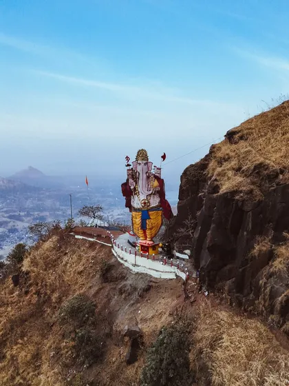 Perspective changes everything. This aerial shot of a giant Ganesha statue on a cliffside gives a divine and powerful perspective that you can only get from a drone.