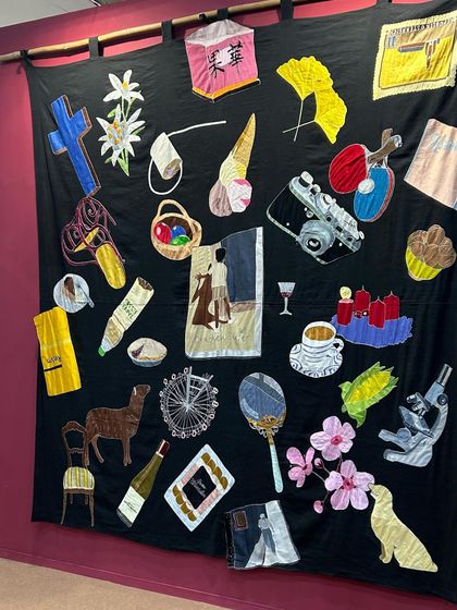 A beautiful textile artwork from Art Mumbai. The vibrant colors and quirky patches make for a visually engaging piece of content.