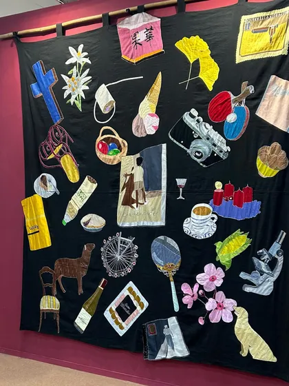 A beautiful textile artwork from Art Mumbai. The vibrant colors and quirky patches make for a visually engaging piece of content.