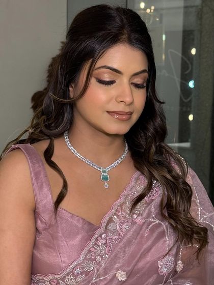 The closed-eye view shows the seamless blend of the eyeshadow. My goal is to create looks that are just as beautiful up close as they are from a distance.