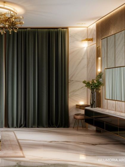 A dressing area featuring a marble-topped console, a large mirror with integrated lighting, and heavy velvet curtains. The combination of materials creates a luxurious and functional personal space.
