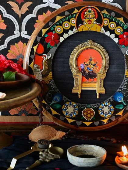 A wider view of the Shani frame, showing the hand-painted figure of Hanuman at the top, who is believed to calm the fierce energies of the dark lord. The piece is a complex narrative of Vedic astrological beliefs.