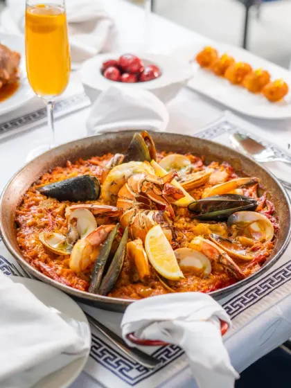 My seafood paella, a dish that tells the story of Spain. Made with saffron-infused rice and the freshest catch, it’s a centerpiece for any celebration, bringing people together around the pan.