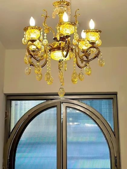 More glam details. This vintage-style chandelier hangs above our entrance, setting a chic tone from the moment you arrive.
