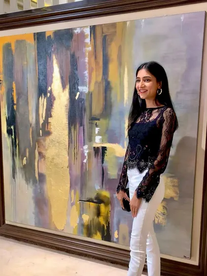 Here I am with "Dusk," a huge 6-foot custom abstract piece I was commissioned to create. I love taking on large-scale projects that can define an entire room with color, texture, and mood.