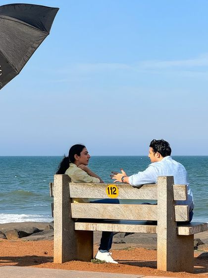 Shooting a scene on a bench by the sea in Pondicherry. Outdoor shoots have their own challenges, like changing light, but the results are always worth it.