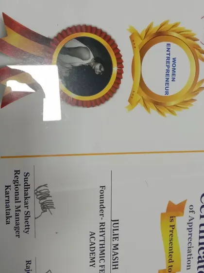 Another look at my Women Entrepreneur award. I am proud to be recognized for my contributions to the fitness community and my work as a business owner.