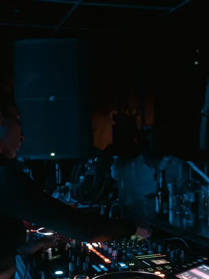 Another perspective from the DJ booth at The Kai Room. The blue lights and focused crowd created a proper underground vibe.