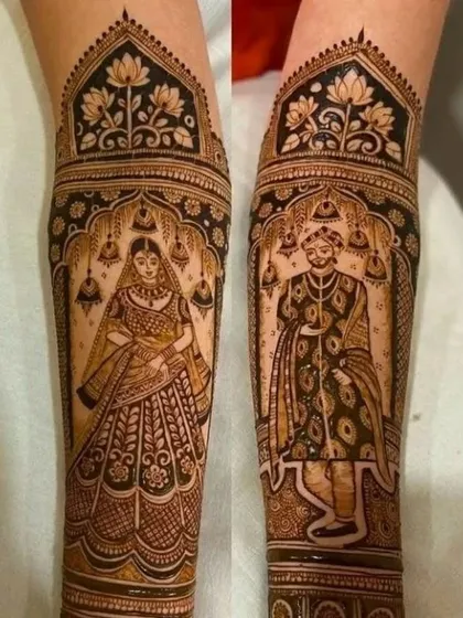 A clear, full-figure portrait design of the bride and groom on the forearms. Each figure is framed within an architectural arch (jharokha), giving it a royal and classic look.