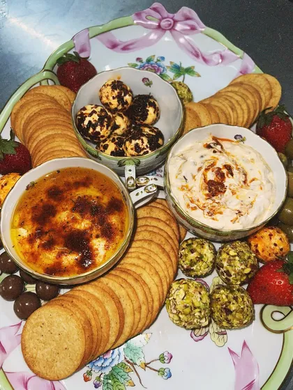 This client wanted a special display on their beautiful porcelain platter. We created a custom arrangement of our flavoured cream cheese, dips, and pistachio-crusted cheese balls to complement their serveware.