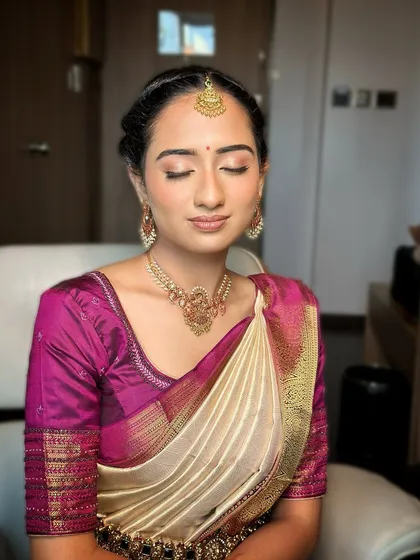 A serene shot with eyes closed, highlighting the delicate and blended eyeshadow work.