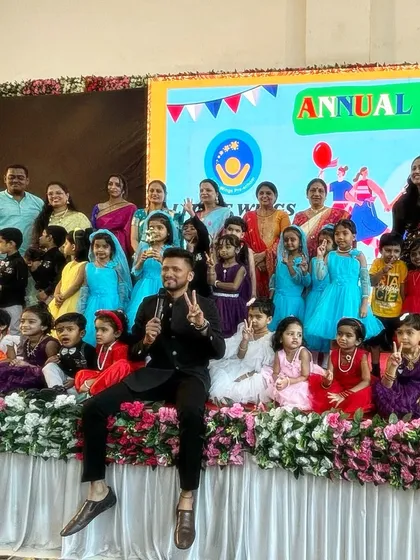 A group photo with all the wonderful kids and teachers after hosting a school annual day.