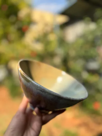 This bowl shows a test of our Rutile glaze over Chun. We're still perfecting it to prevent pin-holing, but the color combination is already a favorite.