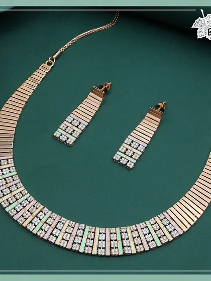 A modern masterpiece in 18ct rose gold, this fusion necklace combines a structured collar with the delicate shimmer of diamonds and pastel-hued enamel. This set is designed for the contemporary woman who appreciates bold lines and subtle color.