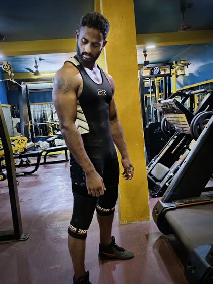 Strength, Believe, Determination. One of my students in his SBD singlet, ready for competition.