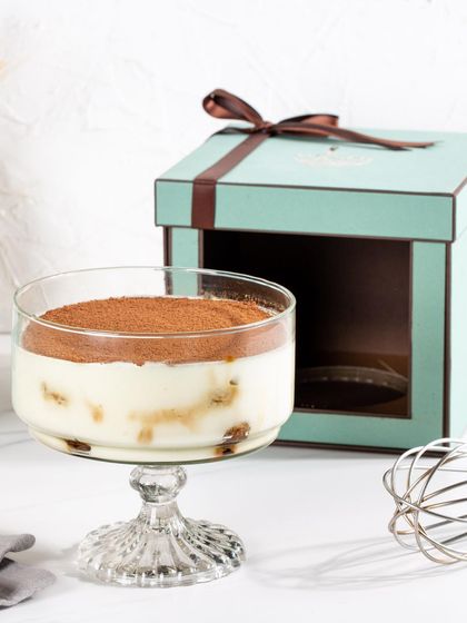 A single serving of my Classic Tiramisu, elegantly packaged and ready to be gifted or enjoyed as a personal treat.