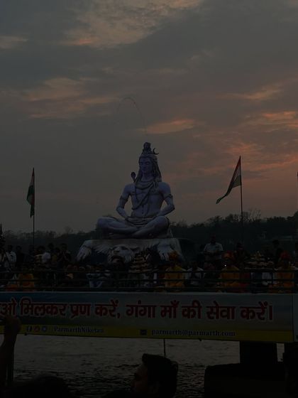 A statue of Lord Shiva at sunset in Rishikesh. The spiritual energy of this town is palpable and provides a constant source of inspiration and connection to the divine.