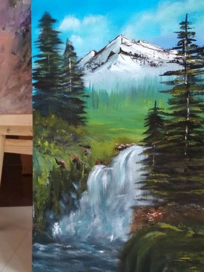 A completed student project of a serene waterfall landscape, showcasing skills in composition and natural textures.