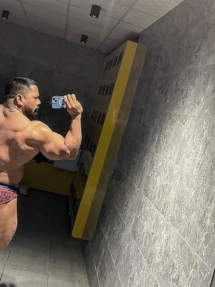 A full back and leg pose. Every muscle group needs to be developed for a balanced physique.