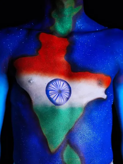 A powerful Republic Day look featuring the map of India painted on the chest. This is a great example of patriotic body art.