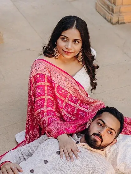 An intimate portrait from the same Jaisalmer shoot. Her makeup is subtle and enhancing, ensuring she looks like the best version of herself. The soft waves in her hair add a touch of romance.