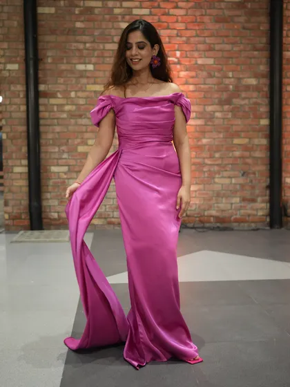 Another view of my pink gown against a rustic brick wall.