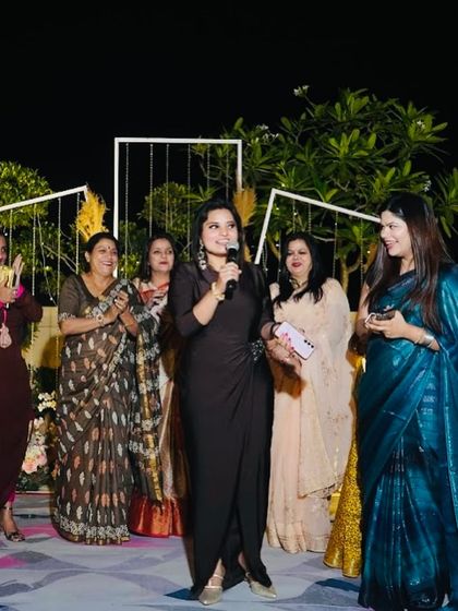 On stage with the ladies of the family for a fun segment. Getting the family matriarchs to participate is always a highlight.