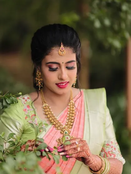 A close up look at Nayana's engagement makeup. You can see the soft pink eyeshadow and matching lip color that brings the whole look together.