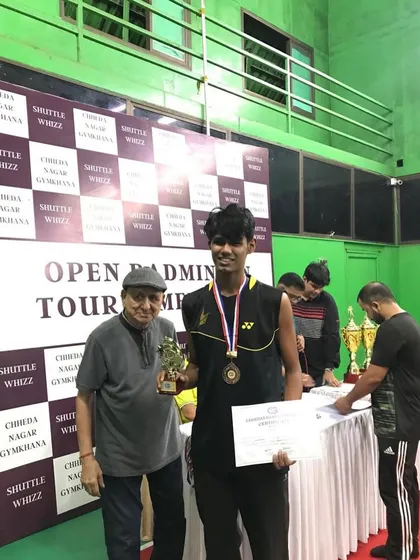 Another champion from the academy with his medal and trophy at the Chheda Nagar Gymkhana Open Badminton Tournament. His dedication during practice really showed.