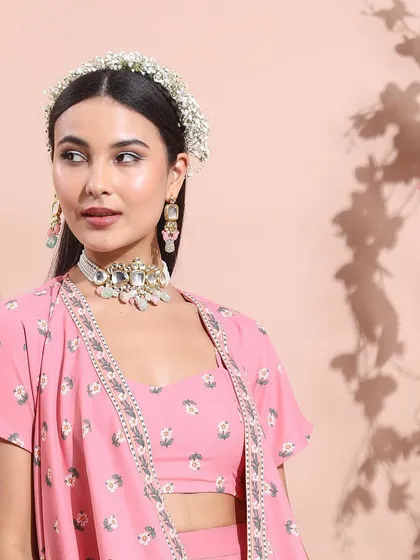 A duplicate of the pink festive look, perfect for showcasing the delicate print and modern silhouette of the outfit.