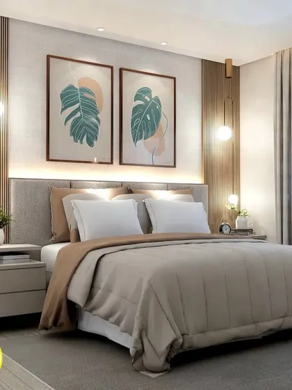 A nature-inspired bedroom with botanical art prints and warm wood tones. The pendant lights on either side of the bed add a modern touch.