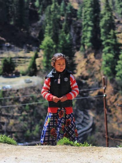 I met this little girl on a roadside in the hills of Himachal. Her traditional clothing and curious, innocent expression tell a story of childhood in the mountains, a beautiful and simple moment from my travels.