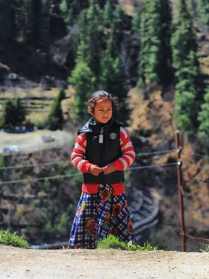 I met this little girl on a roadside in the hills of Himachal. Her traditional clothing and curious, innocent expression tell a story of childhood in the mountains, a beautiful and simple moment from my travels.