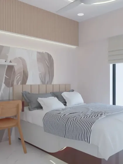A closer view of the study desk integrated next to the bed in this calming room concept.