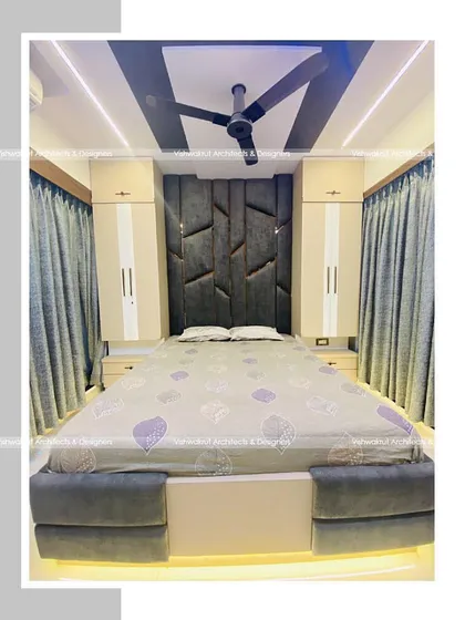 A full view of the master bedroom in Majestic Villa. The bed with under-lighting, the tall headboard, and the matching side cabinets all contribute to a cohesive and high-end design.