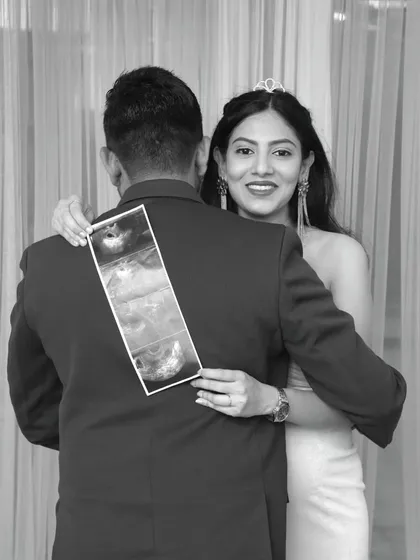 Your story, your props. We love to personalize your maternity photoshoot by including meaningful items, like the very first sonogram pictures of your baby. This black and white shot adds a timeless, artistic feel.