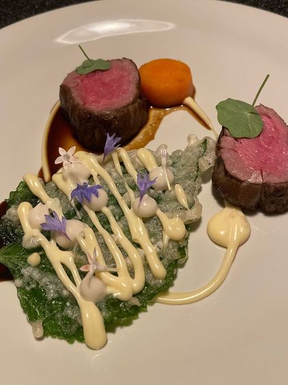 Tenderloin Crepinette served with a tempura-fried shiso leaf. The combination of textures is key to this dish's success.