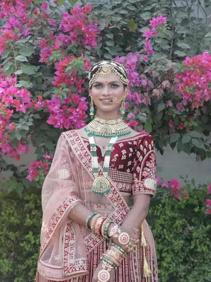 A beautiful portrait of the final bridal look. The makeup is flawless, feminine, and completely convincing.