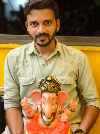 Another happy participant from our Ganpati painting workshop. We provide the idols and all the materials, so you can focus on the joy of painting.
