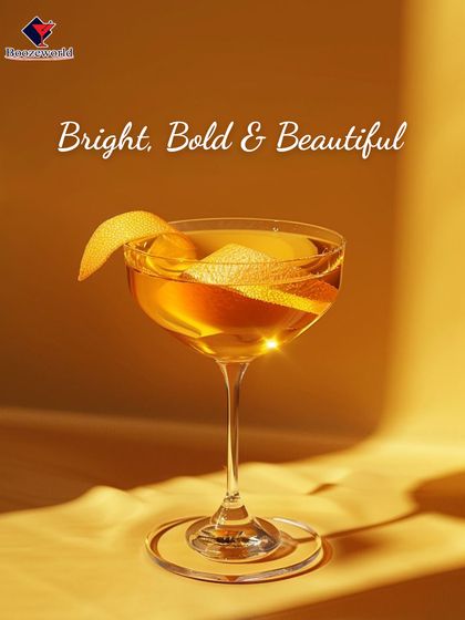 Bright, bold, and beautiful, this golden cocktail shines in the light. The elegant peel garnish adds a touch of class to a drink that is both visually stunning and delicious.