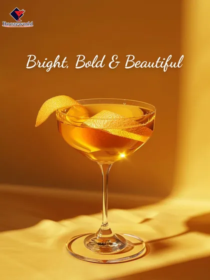 Bright, bold, and beautiful, this golden cocktail shines in the light. The elegant peel garnish adds a touch of class to a drink that is both visually stunning and delicious.